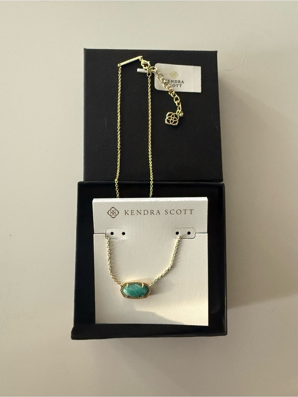 Kendra Scott Gold Necklace with Turquoise Oval Stone